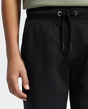 Kids | Kids' Black French terry sweatshorts with a soft feel, elastic waistband, and side pockets for comfort.