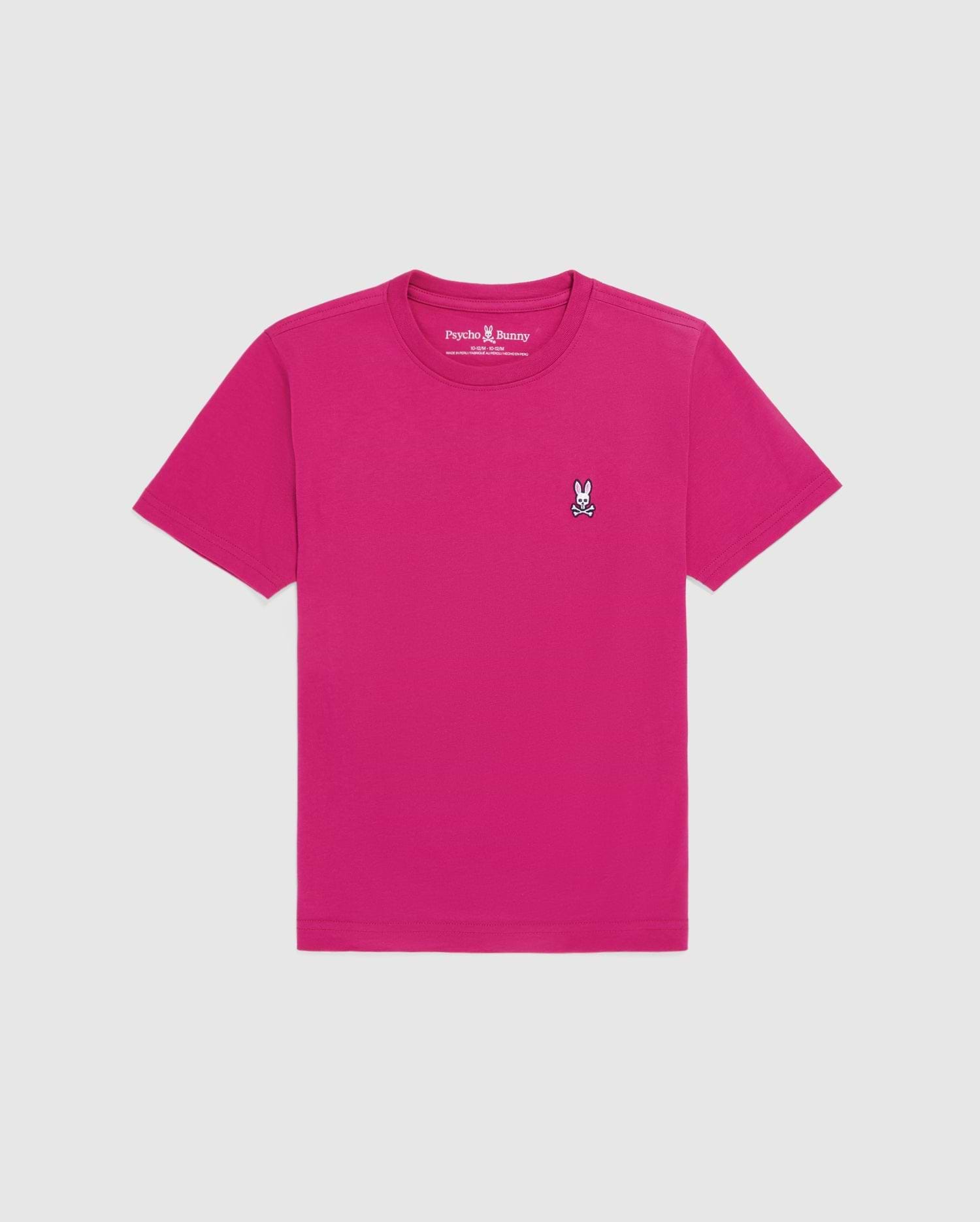 The Psycho Bunny KIDS CLASSIC CREW NECK TEE (B0U014CRPC) is a bright pink Pima cotton shirt featuring a small white and black bunny logo on the left chest, shown against a plain light background.
