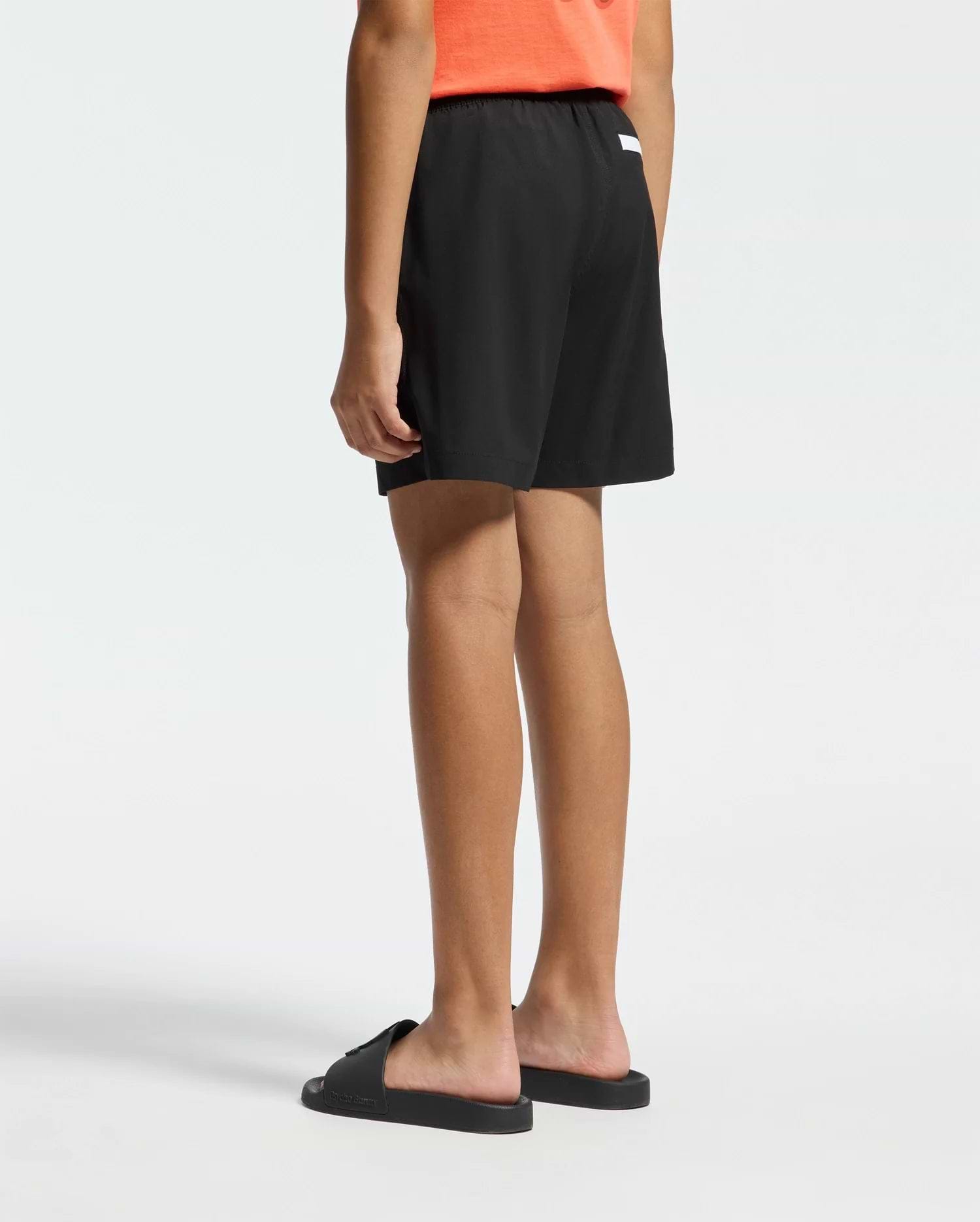 Kids | Black swim shorts with hydrochromic technology