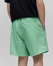 Kids Samos Hydrochromic Printed Swim Trunk, light green, relaxed fit with elastic waistband, side pockets, and a back welt pocket, made from smooth quick-dry fabric.