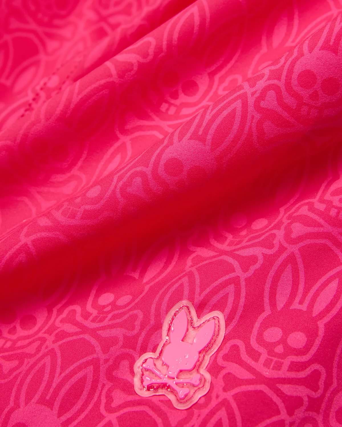 Kids Samos Hydrochromic Printed Swim Trunk in vibrant fuchsia, featuring a subtle tonal hydrochromic bunny skull and crossbones pattern, with a small raised pink rubberized Psycho Bunny logo. (6)