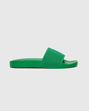Mens Knit Slides in a vibrant green, featuring a textured knit strap with a subtly embossed Psycho Bunny skull logo, offering a bold streetwear aesthetic.