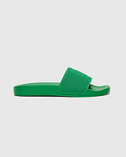 Mens Knit Slides in a vibrant green, featuring a textured knit strap with a subtly embossed Psycho Bunny skull logo, offering a bold streetwear aesthetic.
