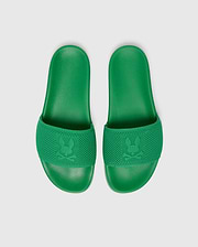 Vibrant green Mens Knit Slides featuring a textured knit strap with a prominent embossed Psycho Bunny skull logo and a comfortable, textured footbed.