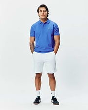 Mens Classic Pique Polo in vibrant royal blue, a classic fit design crafted from textured pique fabric, featuring a small, crisp white embroidered Psycho Bunny skull logo on the left chest.