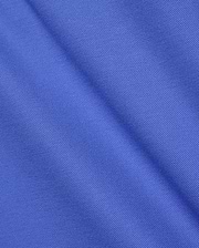 Premium Mens Classic Pique Polo by Psycho Bunny, crafted from a vibrant royal blue, finely textured pique knit fabric with a subtle sheen and soft drape, embodying refined streetwear style.