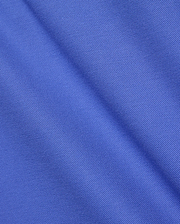Premium Mens Classic Pique Polo by Psycho Bunny, crafted from a vibrant royal blue, finely textured pique knit fabric with a subtle sheen and soft drape, embodying refined streetwear style.