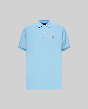Mens Classic Pique Polo in light blue, classic fit, pique knit fabric. Features a small embroidered Psycho Bunny skull logo on the left chest, two white buttons, and dark blue tipping on ribbed cuffs.