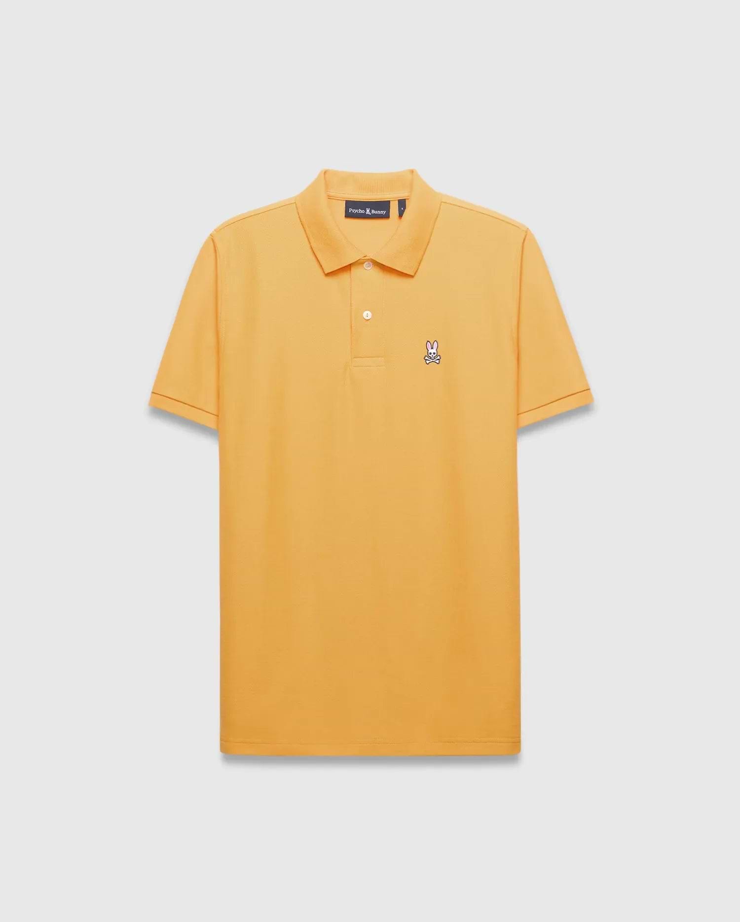 Mens Classic Pique Polo in vibrant marigold orange, with a classic fit, two-button placket, and a small embroidered multi-color Psycho Bunny skull logo on the left chest.