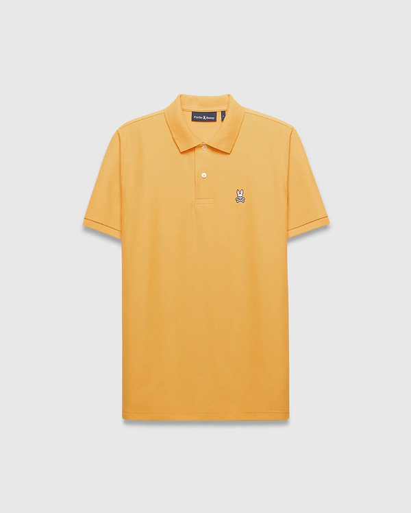 Mens Classic Pique Polo in vibrant marigold orange, with a classic fit, two-button placket, and a small embroidered multi-color Psycho Bunny skull logo on the left chest.