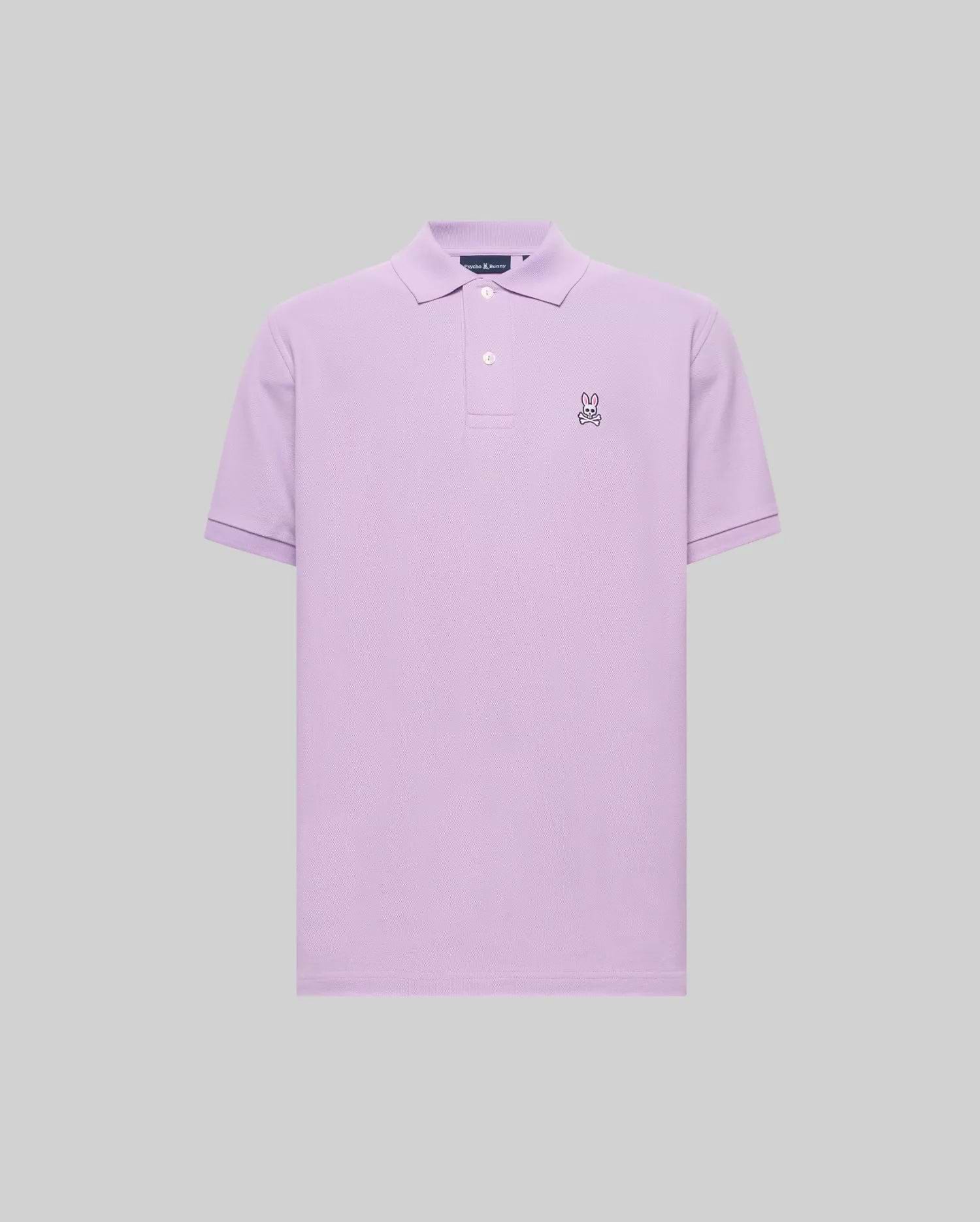 Mens Classic Pique Polo in lavender, a classic fit garment with a two-button placket and a small embroidered Psycho Bunny skull logo on the left chest, detailed in black, white, and pink. (2)
