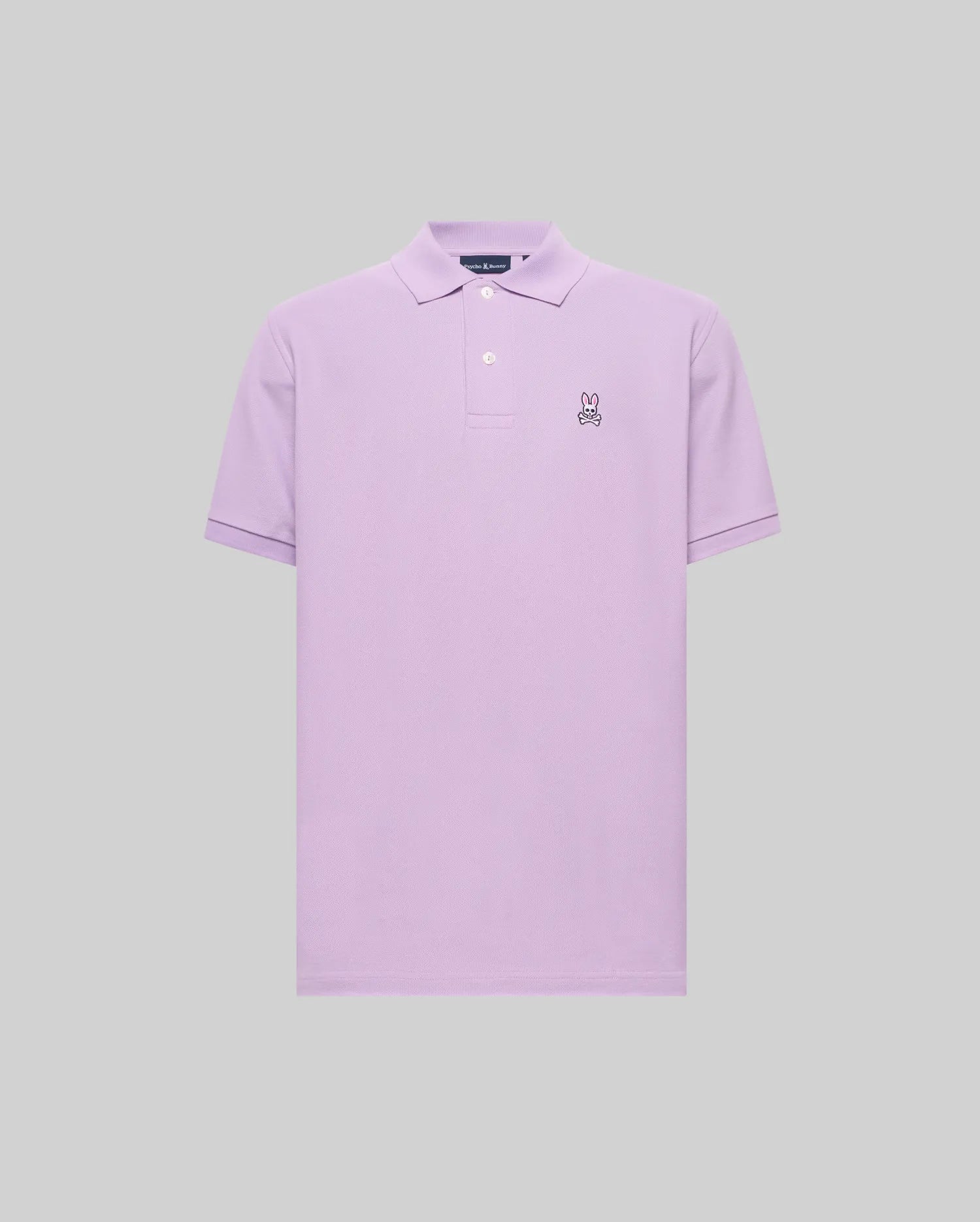 Mens Classic Pique Polo in lavender, a classic fit garment with a two-button placket and a small embroidered Psycho Bunny skull logo on the left chest, detailed in black, white, and pink. (2)