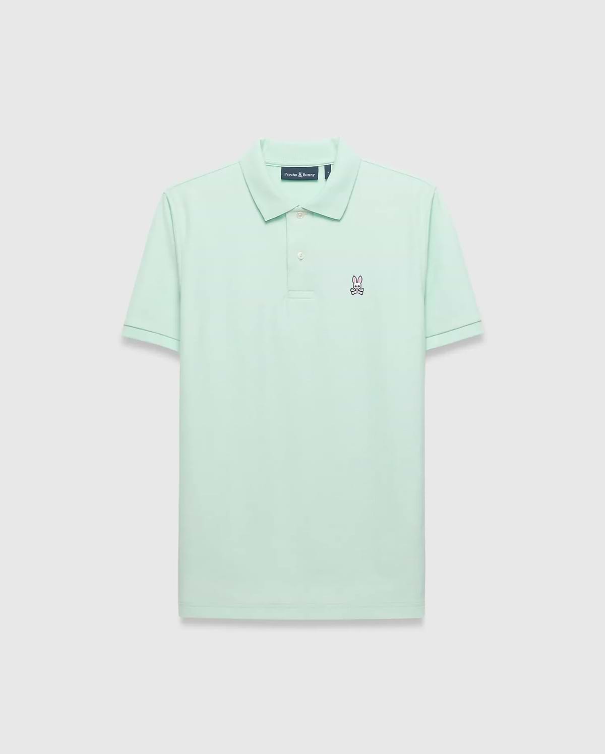 Mens Classic Pique Polo in mint green, featuring a classic fit and pique texture. Small embroidered pink and navy Psycho Bunny skull logo on the left chest with a two-button placket. (2)