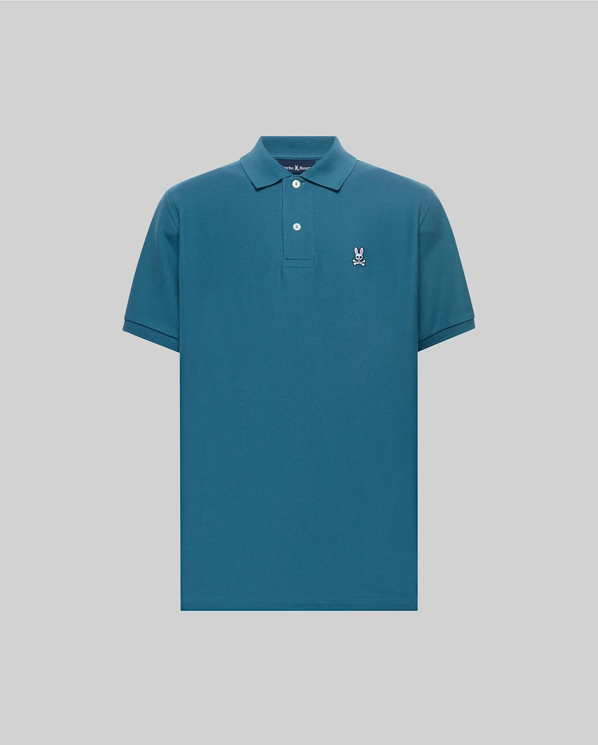 Mens Classic Pique Polo in teal, featuring a classic fit, pique fabric, two white buttons, and a small embroidered white and pink Psycho Bunny skull logo on the left chest. (2)