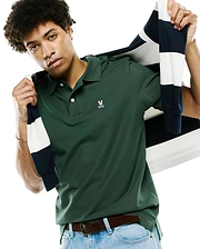 Mens Classic Pique Polo, dark green classic fit pique knit with a small pink embroidered Psycho Bunny skull logo on the left chest and white two-button placket.