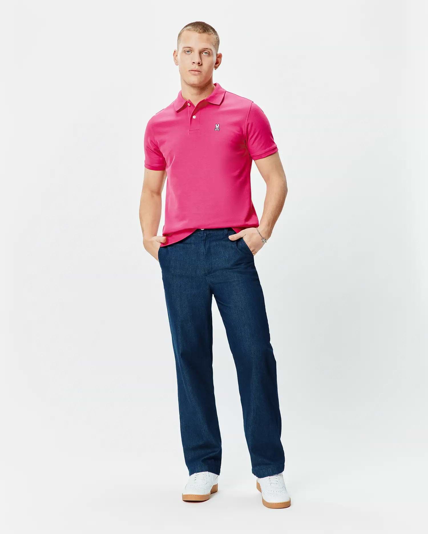 Mens Classic Pique Polo in vibrant fuchsia, featuring a classic fit, textured pique knit, and a small embroidered Psycho Bunny skull logo on the left chest. (5)