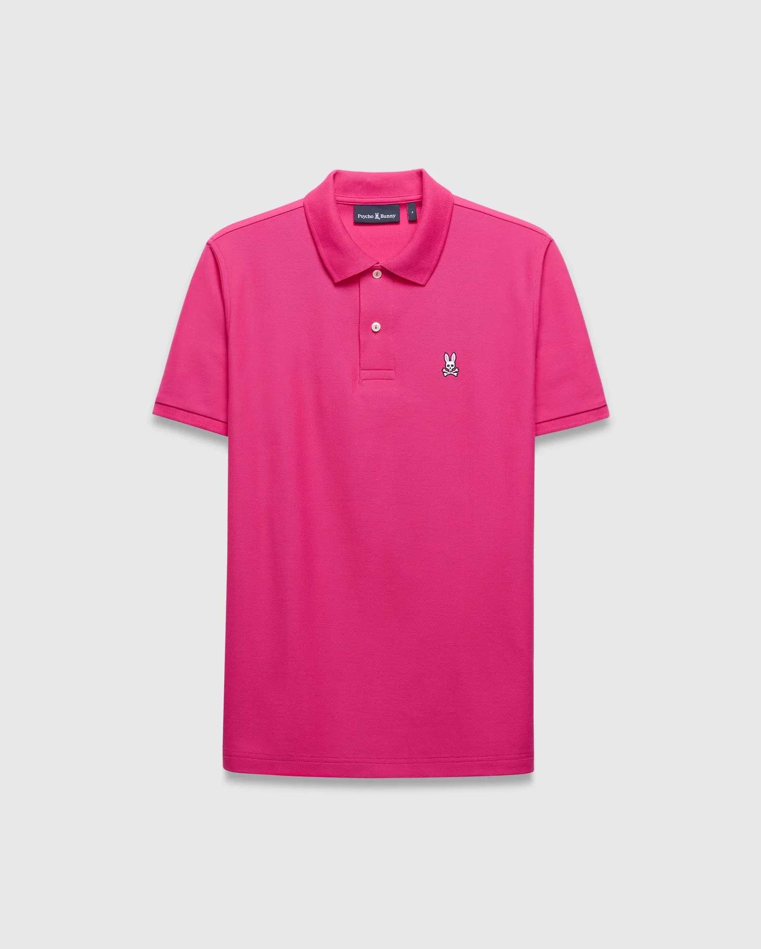 Mens Classic Pique Polo in vibrant hot pink, featuring a classic fit, pique knit texture, two white buttons, and a small embroidered white and black Psycho Bunny skull logo on the left chest. (2)