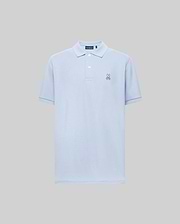 The Psycho Bunny MENS CLASSIC PIQUE POLO (B6K001F200) is a light blue short-sleeved Pima cotton men’s polo with a collar, two buttons, and an embroidered bunny logo on the left chest, shown on a plain gray background.
