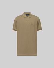 The Psycho Bunny MENS JAMES PIQUE POLO (B6K945D200) is a khaki short-sleeve Pima cotton polo with a collar, two white buttons, and an embroidered bunny logo on the left chest, shown against a plain light gray background. (1)