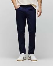 Mens Maverick 10k Step Pant in deep navy, a slim-fit performance pant crafted from smooth, refined fabric, featuring subtle side pockets for a sleek, modern streetwear aesthetic. (1)