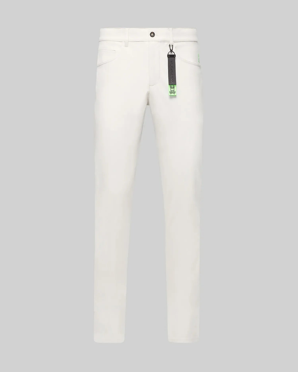 Mens Maverick 10k Step Pant in cream, featuring a classic fit, smooth fabric, a neon green Psycho Bunny keychain, and a small embroidered neon green bunny skull logo on the right hip.