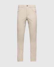 The MENS MAVERICK 10K PANT - B6P788D200 by Psycho Bunny, in light beige, features a practical five-pocket design and a classic straight-cut silhouette. Set against a plain white background, these pants ensure comfort with their innovative four-way stretch fabric and secure closure featuring both button and zip elements.