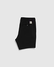 Black Psycho Bunny eco-friendly shorts with an elastic waistband and a label on the back, displayed on a plain white background.