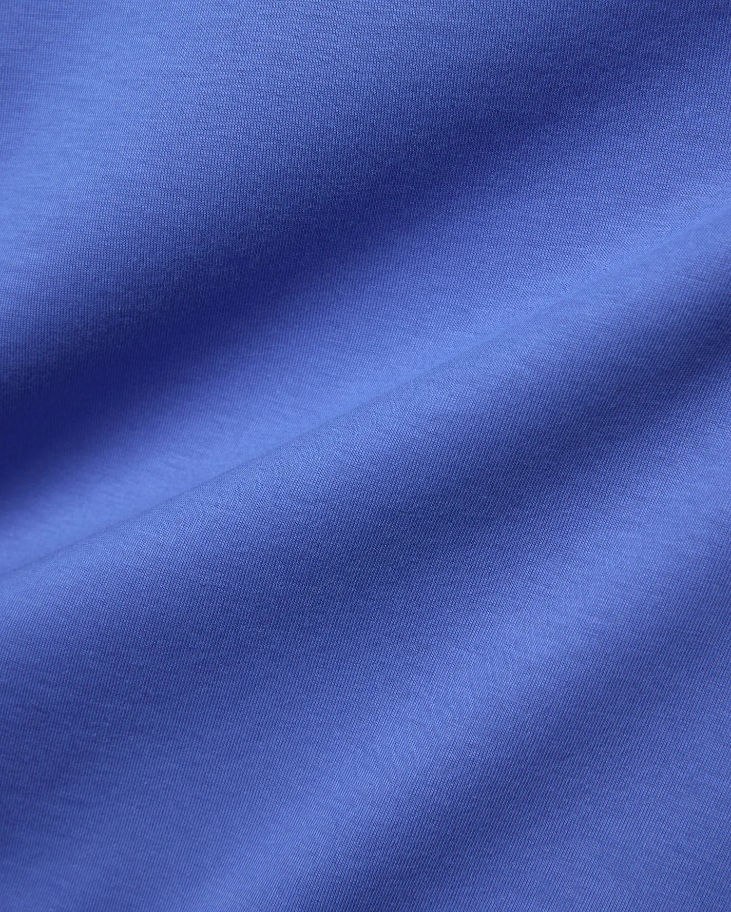 Mens Classic Crew Neck Tee in a vibrant blue, premium jersey fabric, showcasing its smooth, soft texture and refined drape, perfect for refined streetwear.