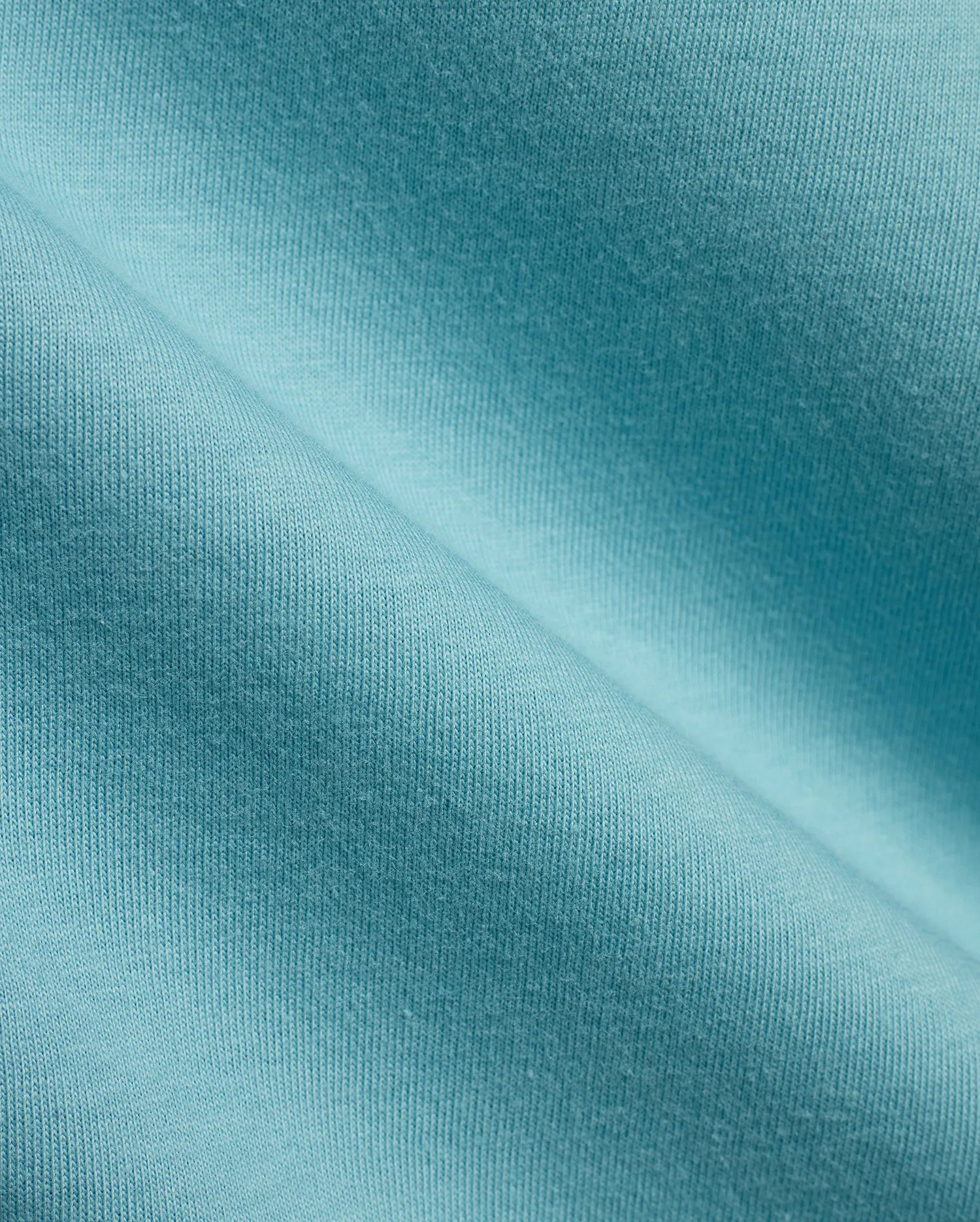 Psycho Bunny Mens Classic Crew Neck Tee in premium, vibrant aqua blue, crafted from soft, finely ribbed jersey knit fabric, offering a comfortable classic fit for refined streetwear style. (6)