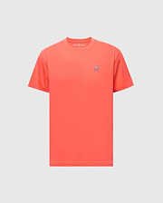 The men's classic crew neck tee (B6U014F200) by Psycho Bunny, made from soft Pima cotton, showcases a small embroidered bunny logo on its chest with a red-orange hue against a light gray backdrop.