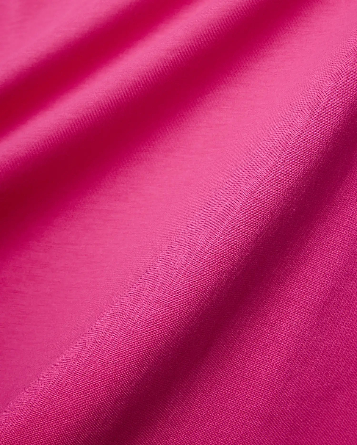 Rich, saturated fuchsia pink Mens Classic Crew Neck Tee, featuring a soft, premium jersey knit fabric with subtle texture and elegant natural folds. (6)