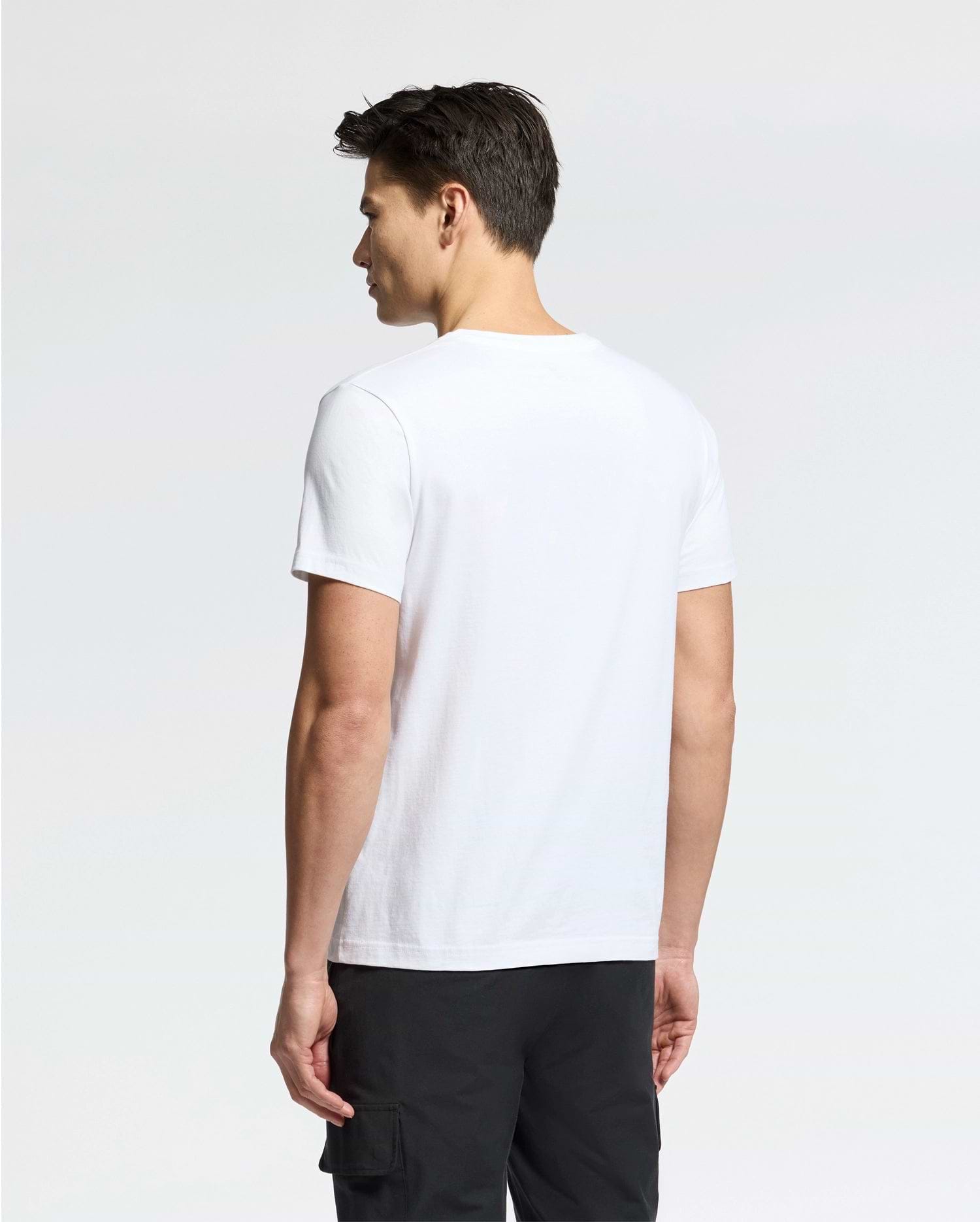 Person facing away, dressed in a Psycho Bunny MENS CLASSIC V NECK TEE - B6U100ARPC crafted from 100% Pima cotton and black pants, stands against a simple white background.