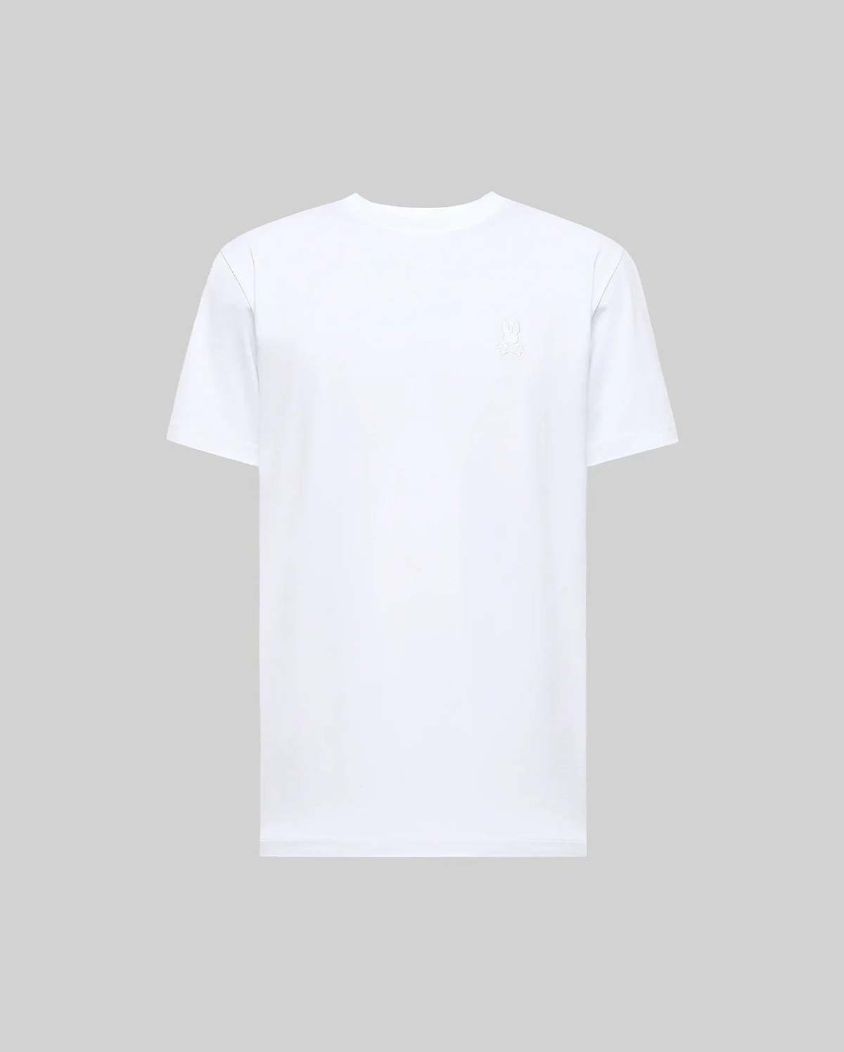 The Psycho Bunny MENS JAMES PREMIUM CREW NECK TEE (B6U952D200), a plain white short-sleeve Pima cotton shirt, is displayed front-facing on a light gray background with a subtle embroidered logo on the left chest.