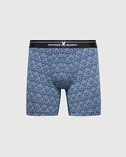 The Psycho Bunny Men's 2 Pack Boxer Brief, style B6V481F200, boasts a breathable stretch Pima cotton with a blue and black geometric pattern, featuring a black waistband with the "Psycho Bunny" logo in white.