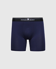 The Psycho Bunny Men's 2 Pack Boxer Briefs (B6V481F200) in navy blue are made from soft Pima cotton, featuring a black elastic waistband with "Psycho Bunny" and the bunny logo in white on a light gray background, offering stretchy knit comfort.
