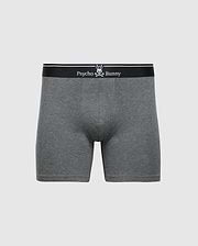 The MENS SOLID KNIT 2 PACK BOXER BRIEF - B6V906ARCM by Psycho Bunny features grey briefs made from soft, stretchy Pima cotton with a black waistband and white "Psycho Bunny" logo, offering ultimate comfort and sleek design.