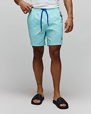Mens Samos Hydrochromic Printed Swim Trunk in aqua, featuring a smooth texture, royal blue drawstring with Psycho Bunny text, small embroidered blue bunny skull logo on the left leg, and a branded tag on the right hip.