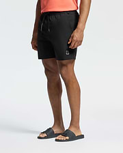 Mens Samos Hydrochromic Printed Swim Trunk in black, featuring an elastic waistband, drawstring with Psycho Bunny text, and a small grey bunny skull logo on the left thigh. Classic fit, smooth fabric.