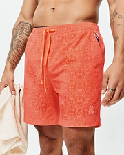Mens Samos Hydrochromic Printed Swim Trunk in vibrant coral, with an all-over tonal bunny skull pattern, orange Psycho Bunny drawstrings, and a small embroidered bunny logo on the left leg.