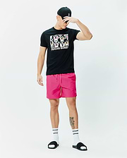 Black classic fit jersey t-shirt with large colorful Psycho Bunny skull graphic, bright pink Mens Samos Hydrochromic Printed Swim Trunk 6 with small embroidered logo, and black cap with pink embroidered Psycho Bunny logo. (6)