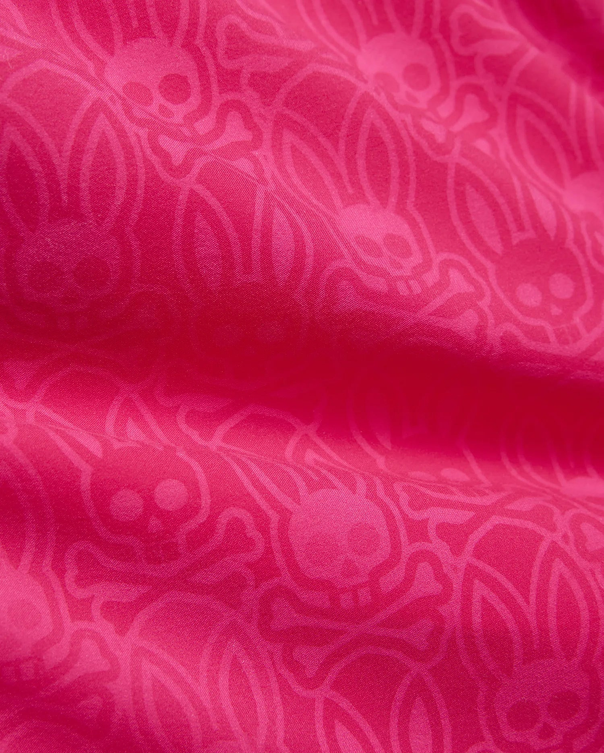 Mens Samos Hydrochromic Printed Swim Trunk 6 in bright fuchsia, featuring a subtle tone-on-tone Psycho Bunny skull and crossbones logo pattern on smooth swimwear fabric. (7)