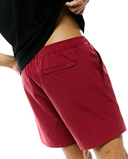 Mens Samos Hydrochromic Printed Swim Trunk in deep red, featuring a relaxed fit, smooth quick-dry fabric, elastic waistband, side pockets, and a back welt pocket. (3)