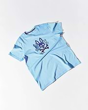 Mens Oscar Graphic Tee, a sky blue classic fit jersey knit t-shirt featuring a large central graphic of purple and dark blue bunny skulls, crossbones, and white Psycho Bunny script. (1)