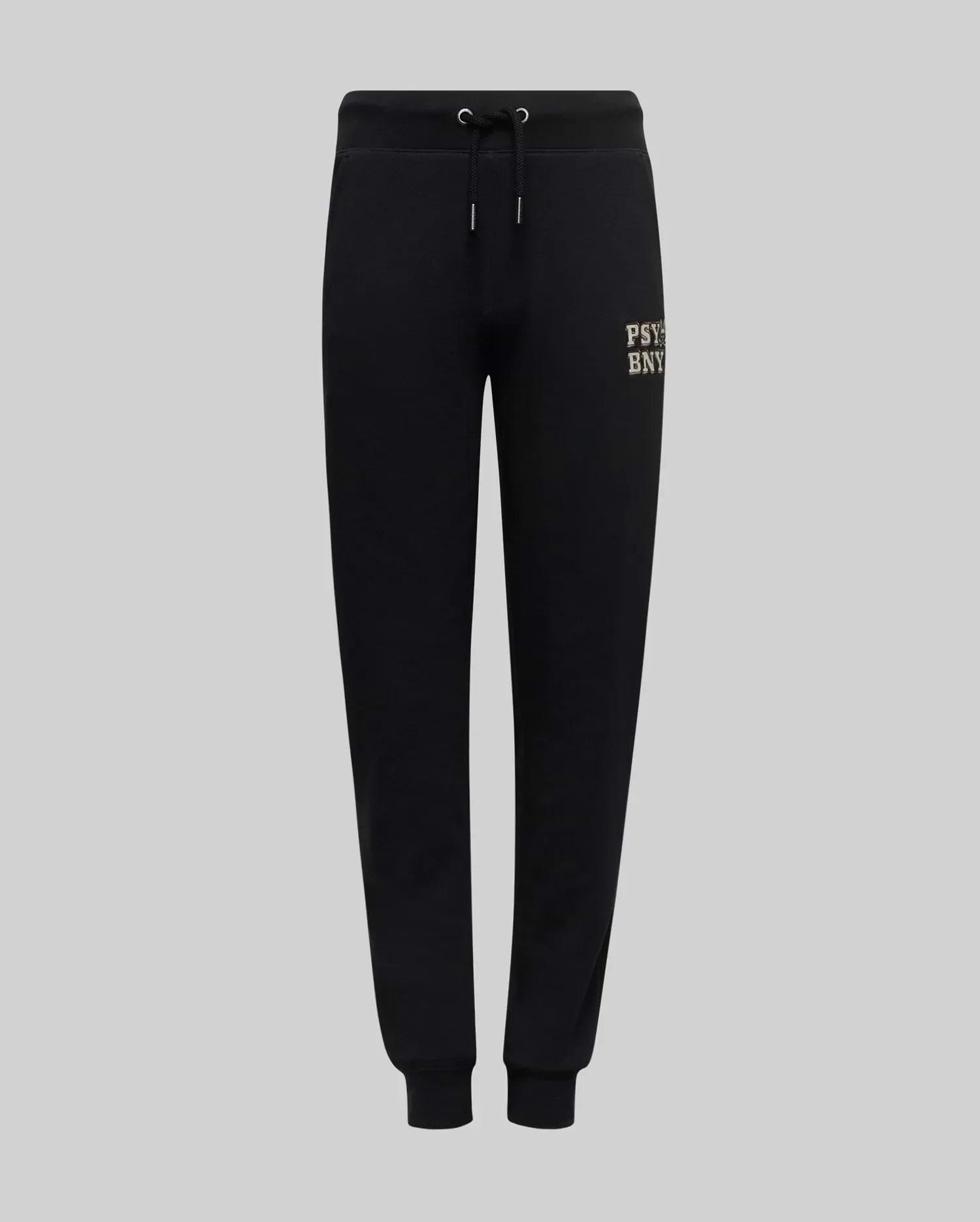 The Psycho Bunny KIDS WADE CORD PATCH SWEATPANT (KB0800002) features black premium cotton-blend sweatpants with an elastic waistband, drawstring, fitted cuffs, and a small printed logo on the left thigh. Shown on a light gray background.