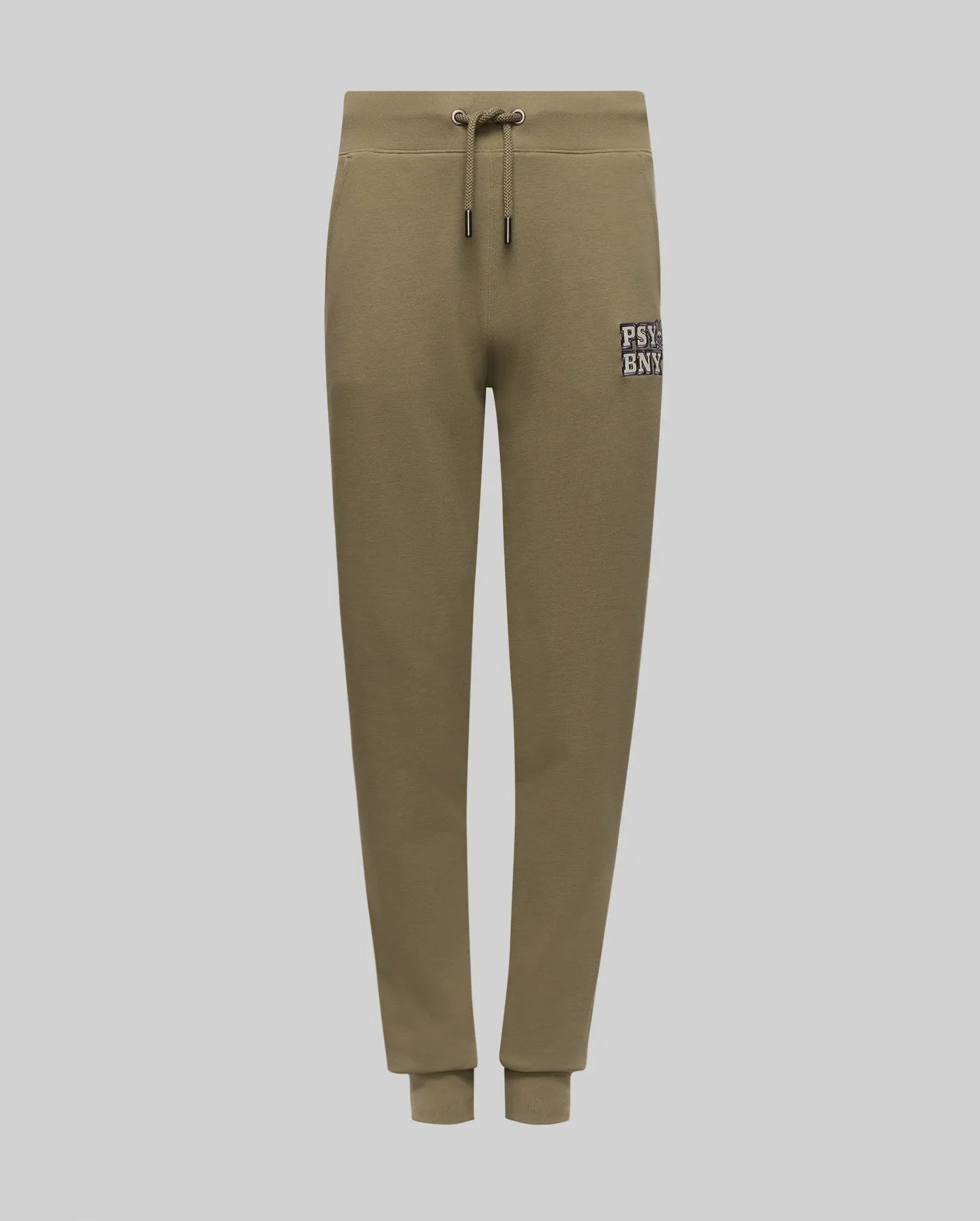 The KIDS WADE CORD PATCH SWEATPANT (KB0800002) by Psycho Bunny is an olive green jogger with a drawstring waist, ribbed cuffs, side pockets, and a white "PSBNY" logo on the left thigh. Made from premium cotton blend.