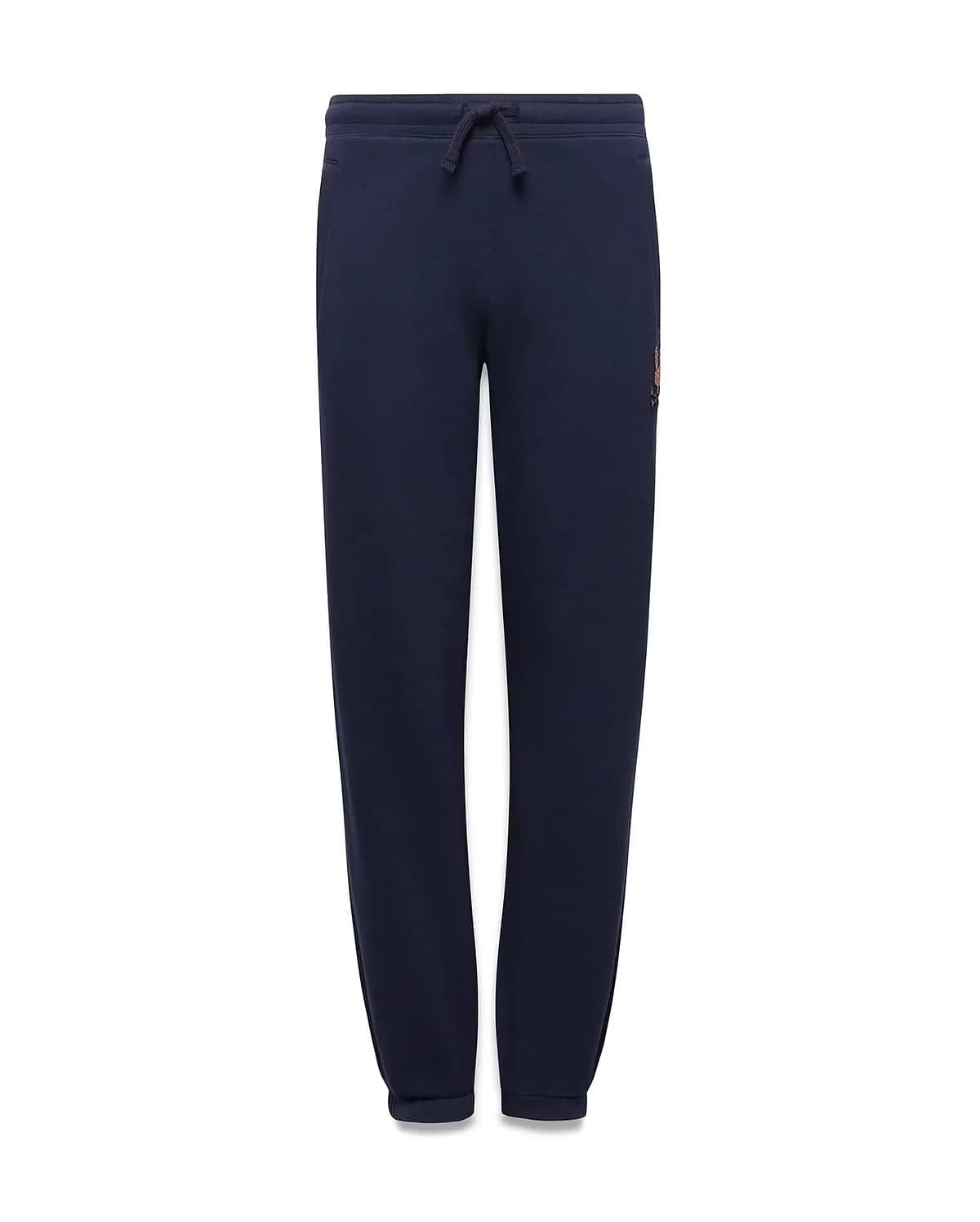 Kids Darcy Sweatpant in navy, featuring a relaxed fit, smooth jersey knit, drawstring waist, and a small, multi-color embroidered Psycho Bunny skull logo on the upper right thigh.
