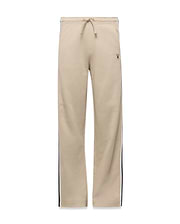 Kids Ty French Terry Sweatpant in beige, featuring a relaxed fit, drawstring waist, navy and white side stripes, and a small embroidered Psycho Bunny skull logo on the upper right thigh.