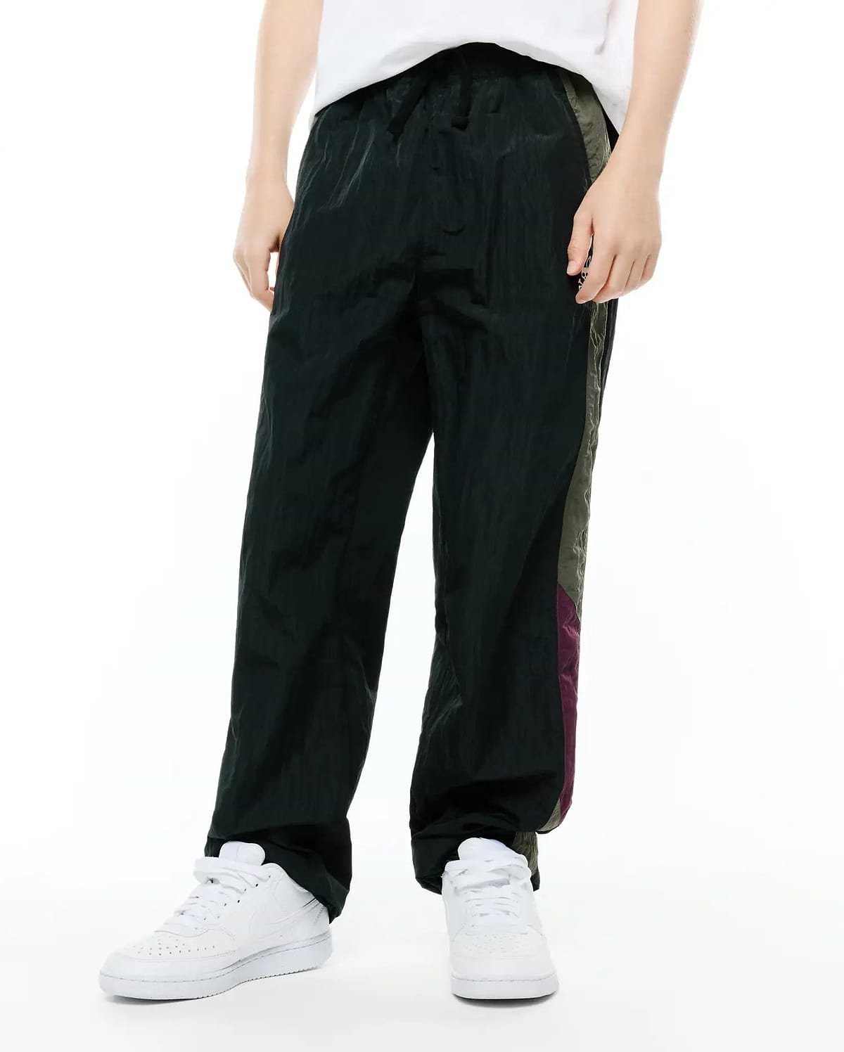 Kids Alder Nylon Colorblock Pant, dark green, featuring a relaxed fit, crinkled nylon texture, and bold side colorblock panels in olive green and purple. (2)