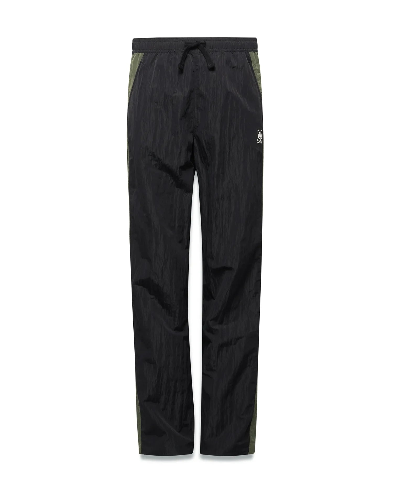 Kids Alder Nylon Colorblock Pant in black crinkled nylon with olive green side panels, featuring a relaxed fit and a small white Psycho Bunny skull logo on the right hip. (5)