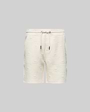 Kids Dustin Sweatshort, cream textured knit with a relaxed fit. Features an all-over embossed checkerboard pattern of Psycho Bunny skull logos and geometric squares.